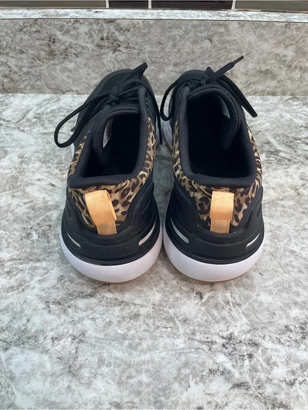Adidas RapidaSport leapord print kids size 6.5
